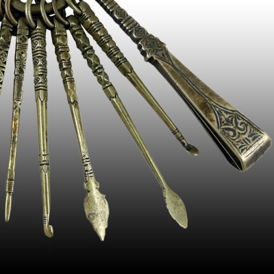 Ornately decorated Minangkabau set of silver tools for processing betel nut