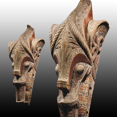Large pair of Singa-Singa heads taken from a Batak Toba house gable