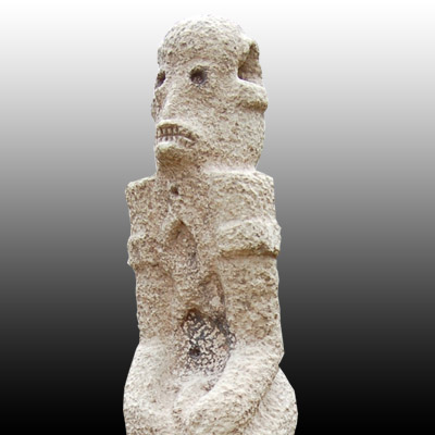 Megalithic Sumba Island stone grave effigy or Penji with horrific skeletal gaze